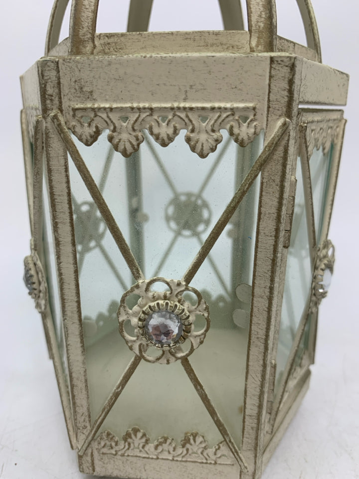 DISTRESSED CANDLE LANTERN.
