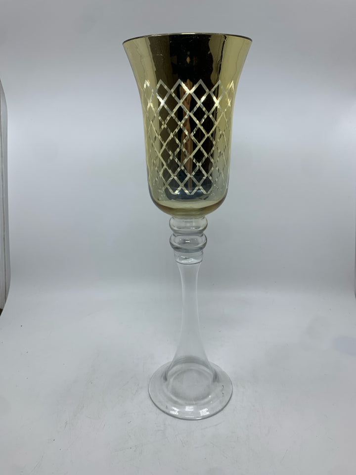 METALLIC PEDESTAL CANDLE HOLDER.