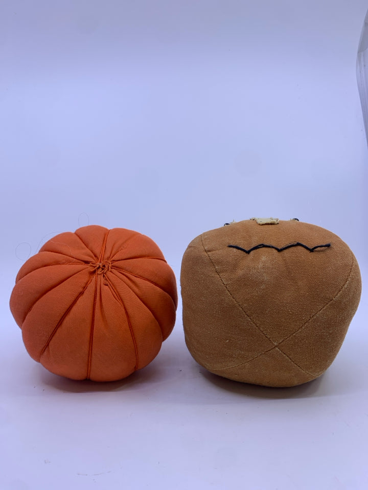 2 FABRIC PUMPKINS, ORANGE AND BROWN W/FACE.