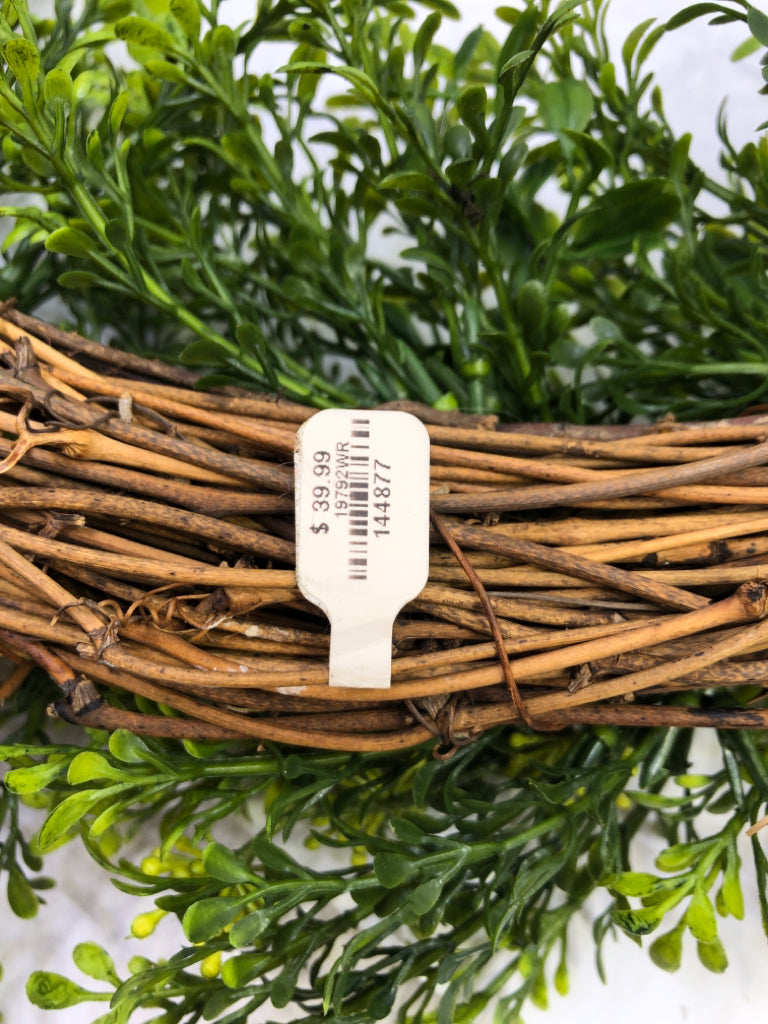 TWIG W GREENS WREATH.