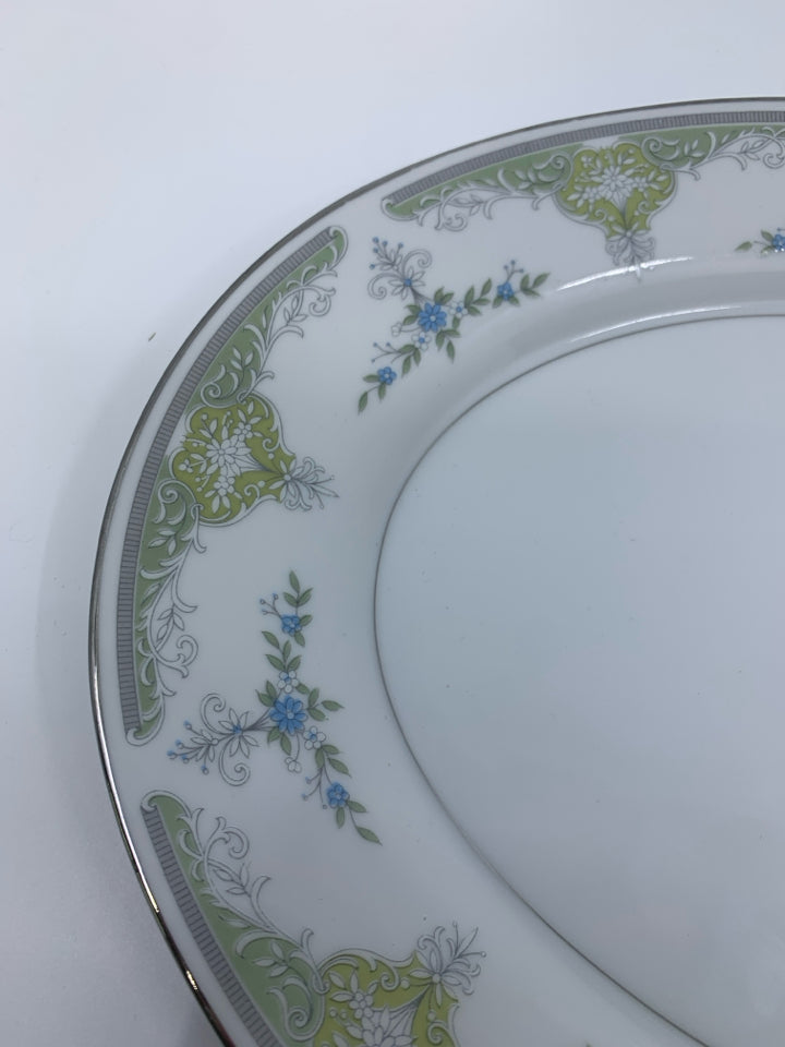 WHITE OVAL PLATTER W/ BLUE FLOWERS & GREEN DETAILS.