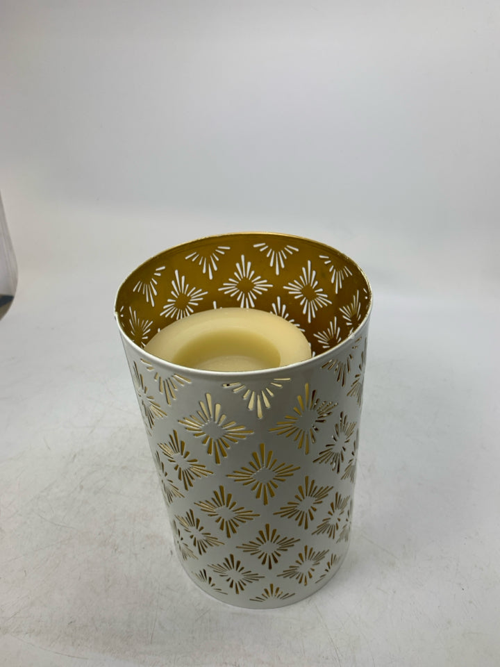 PIERCED METAL CYLINDER CANDLE HOLDER W/ FAUX PILLAR CANDLE.