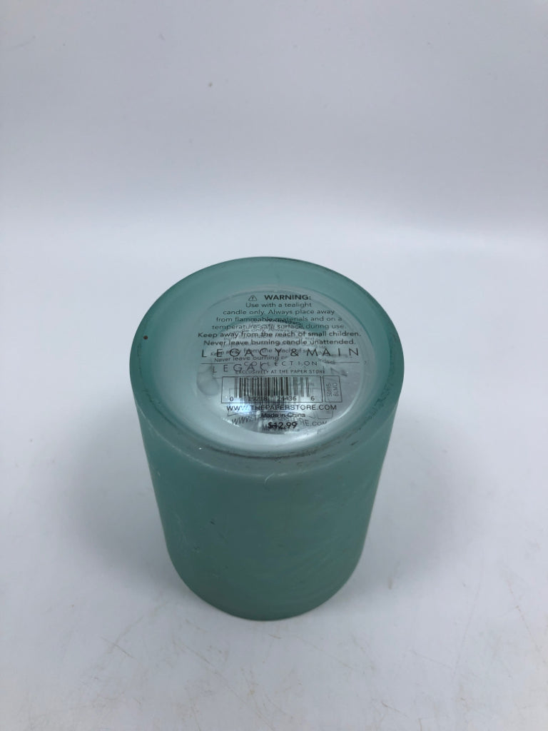 FROSTED SAND DOLLAR TEA LIGHT HOLDER.