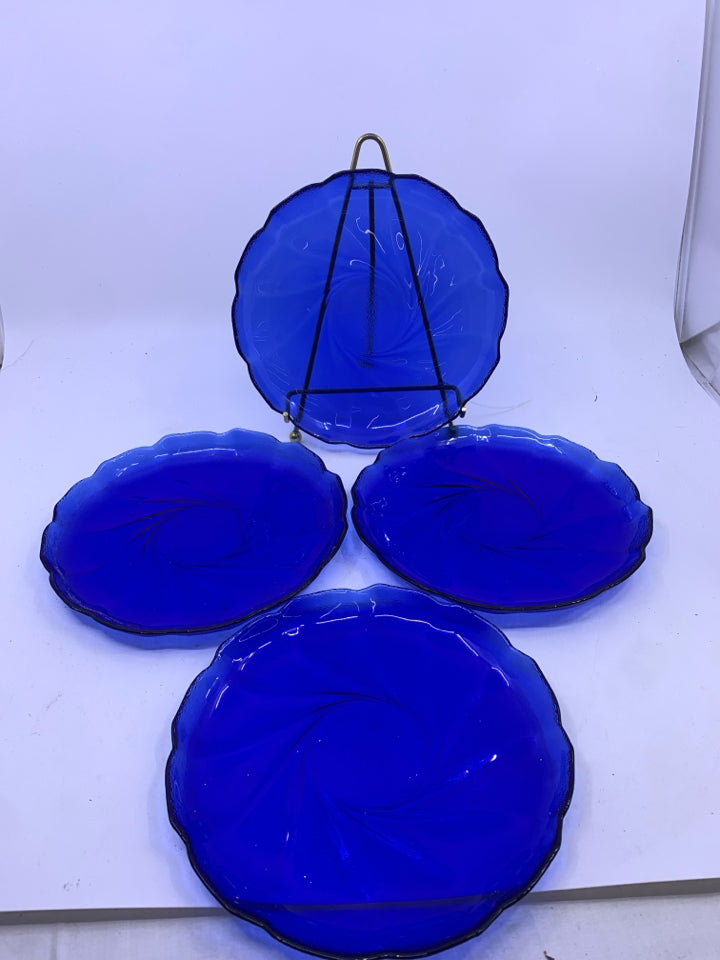 4 COLBALT BLUE GLASS LUNCH PLATES.