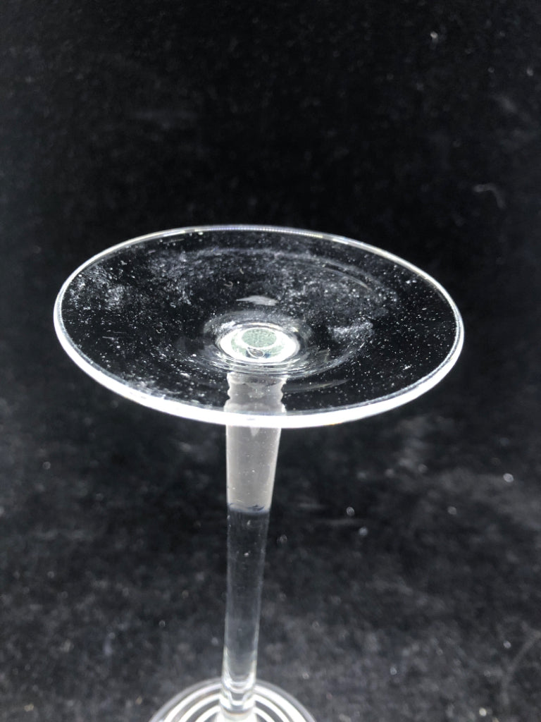 2 FOOTED GLASS TEA LIGHT HOLDERS W/ WHITE SWIRL.
