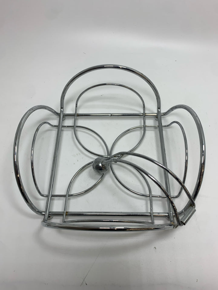 SILVER METAL NAPKIN HOLDER.