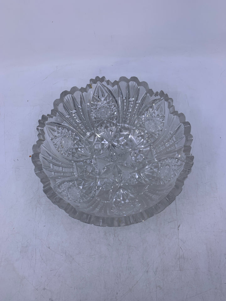 HEAVY CUT CRYSTAL BOWL W/ STAR ON BOTTOM.