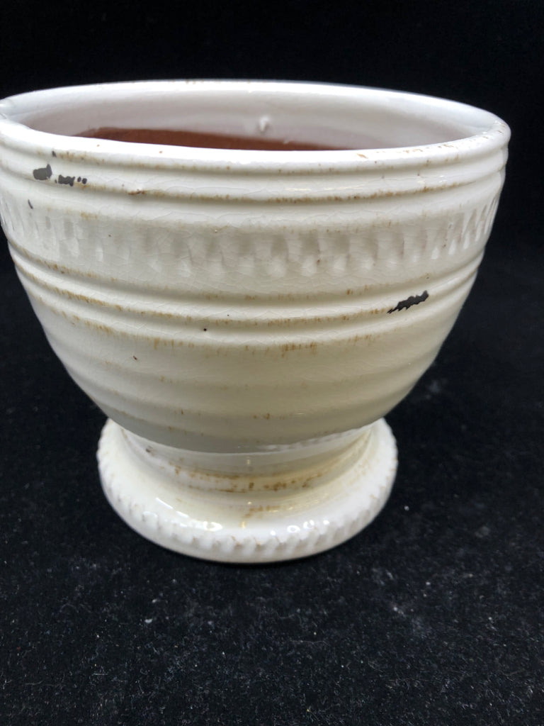 DISTRESSED FOOTED WHITE PLANTER.