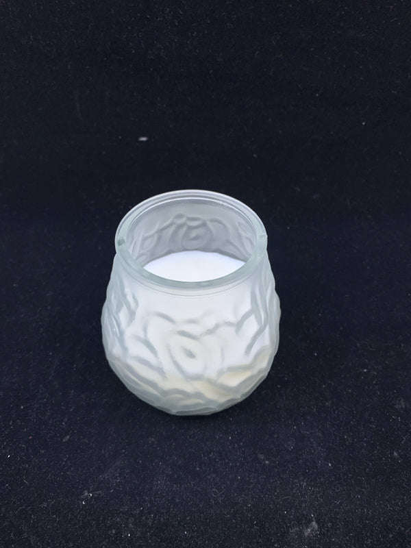 FROSTED CLEAR GLASS W/ CANDLE EMBOSSED SQUIGGLES.