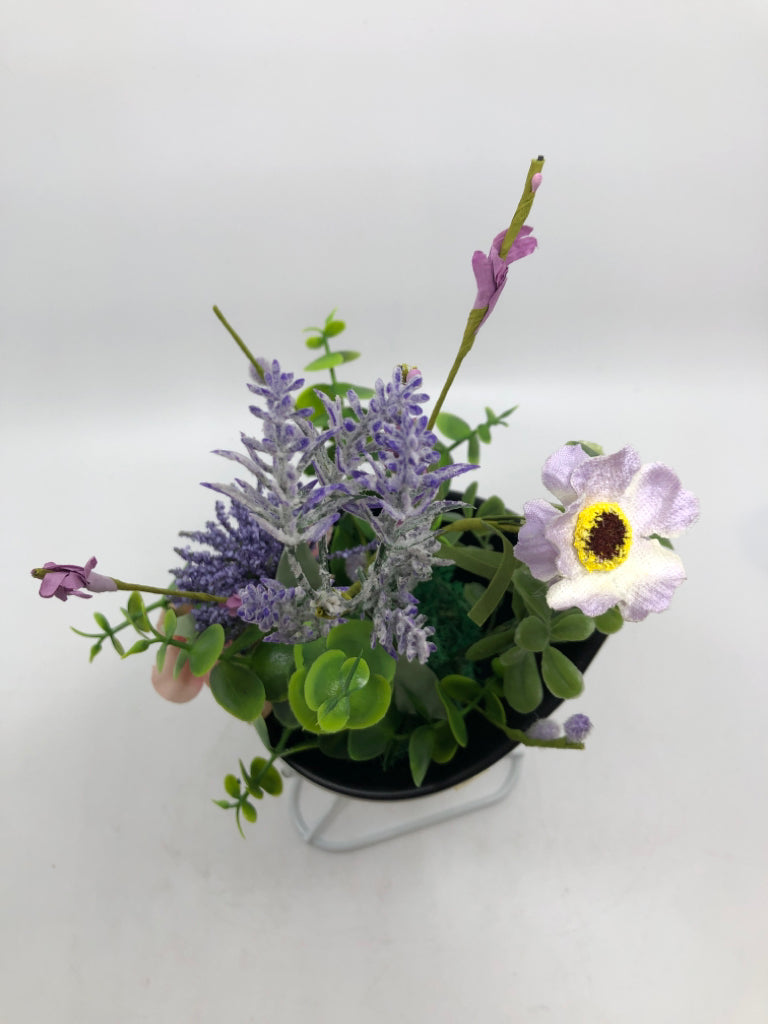 FAUX FLORALS IN STANDING PLANTER.