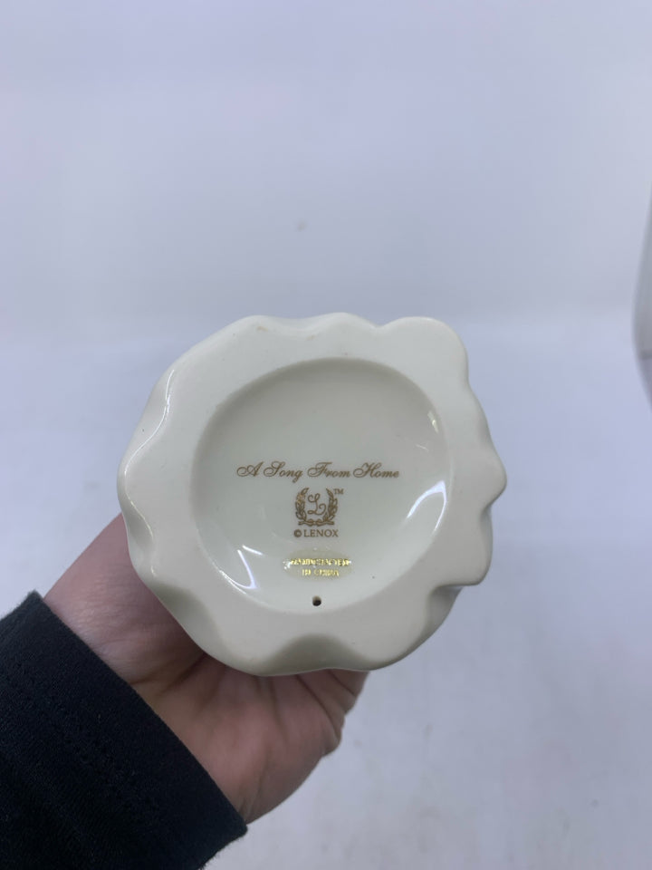 BLONDE WOMAN W/ MICROPHONE "A LONG WAY FROM HOME".