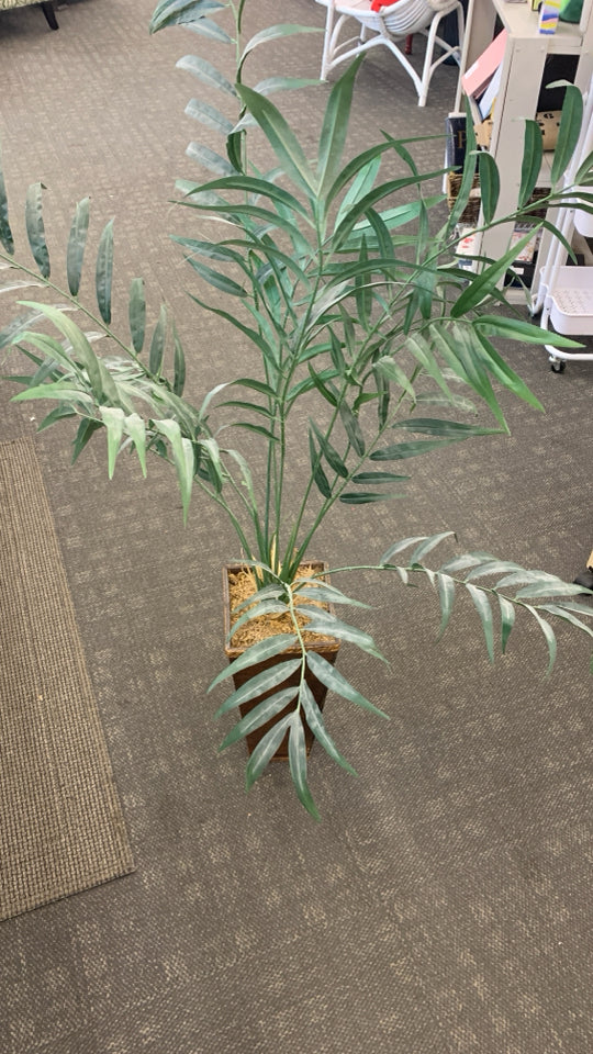 FAUX PALM PLANT IN BROWN RECTANGULAR POT.