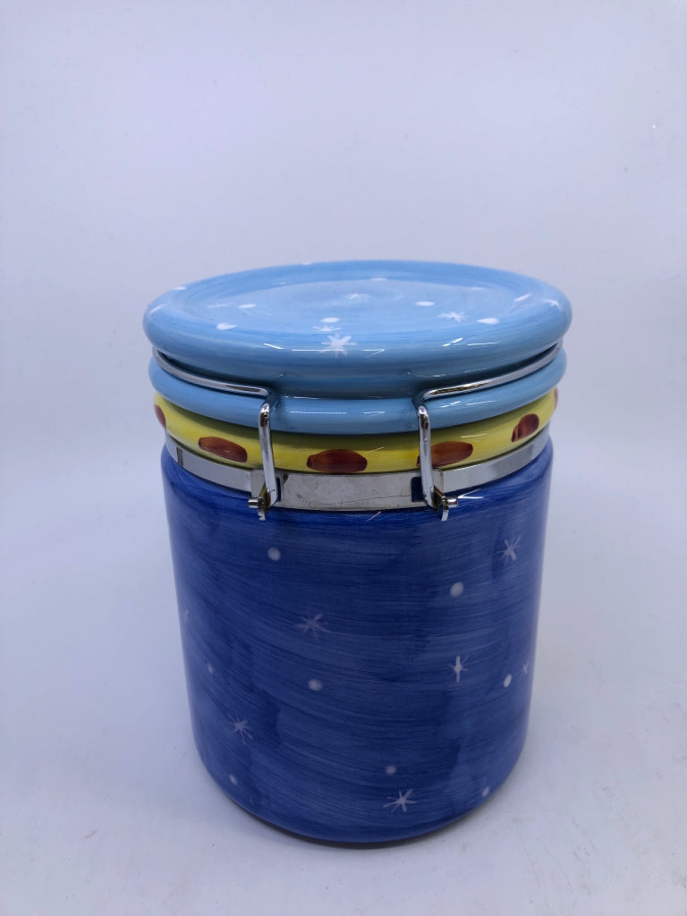 BLUE SANTA CANISTER W CHRISTMAS TREE.