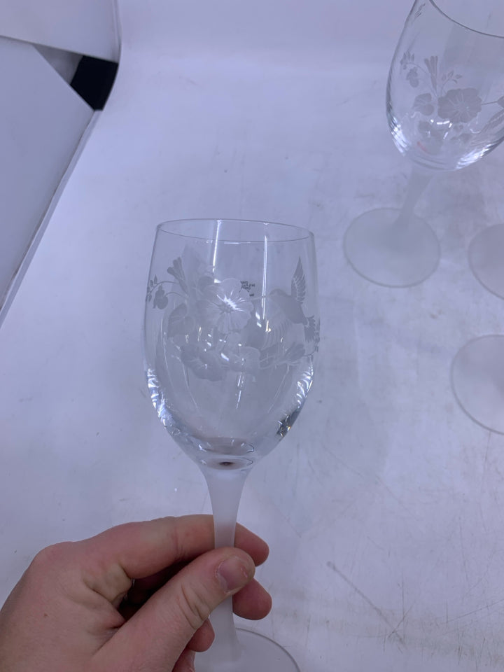 4 FROSTED STEMS W/ HUMMING BIRDS WINE GLASSES.