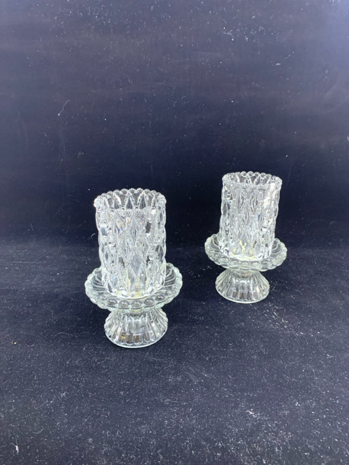 4 PC CRYSTAL VOTIVE CANDLE HOLDERS.