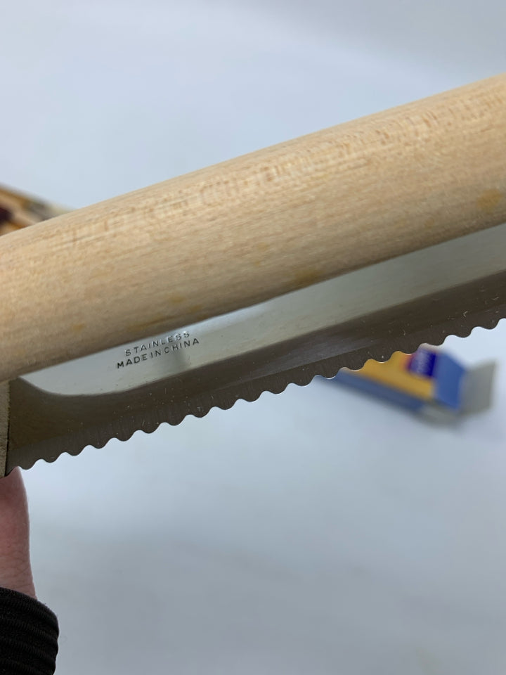NIB EKCO BREAD SLICER.