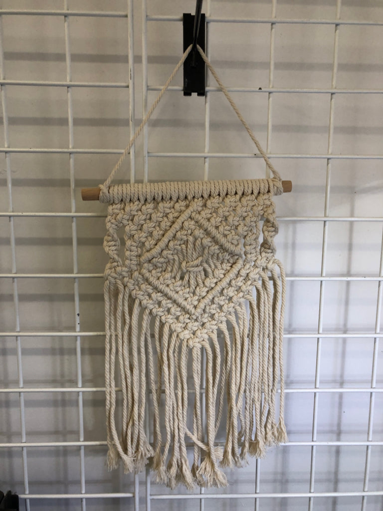 WHITE MACRAME WALL HANGING.