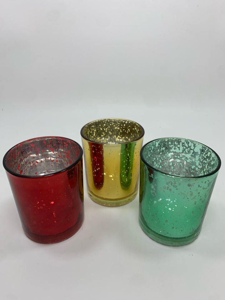 3 MULTI-COLORED SPECKLED VOTIVE HOLDERS.