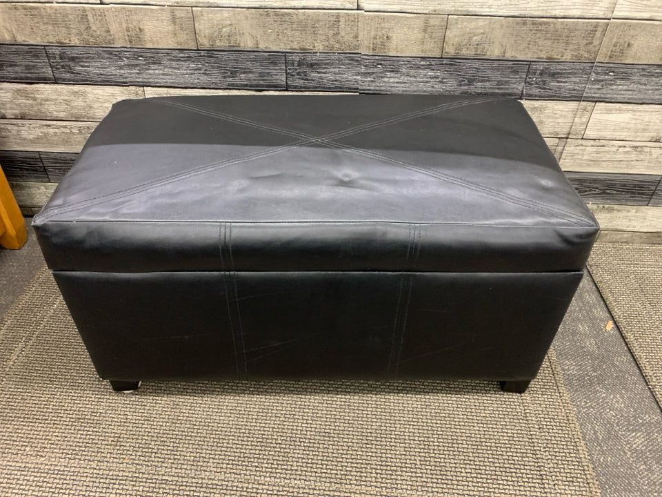FAUX BLACK LEATHER BENCH W/ FLIP TOP STORAGE.