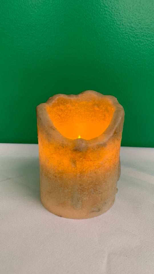 FAUX LIGHT UP BATTERY CANDLE.