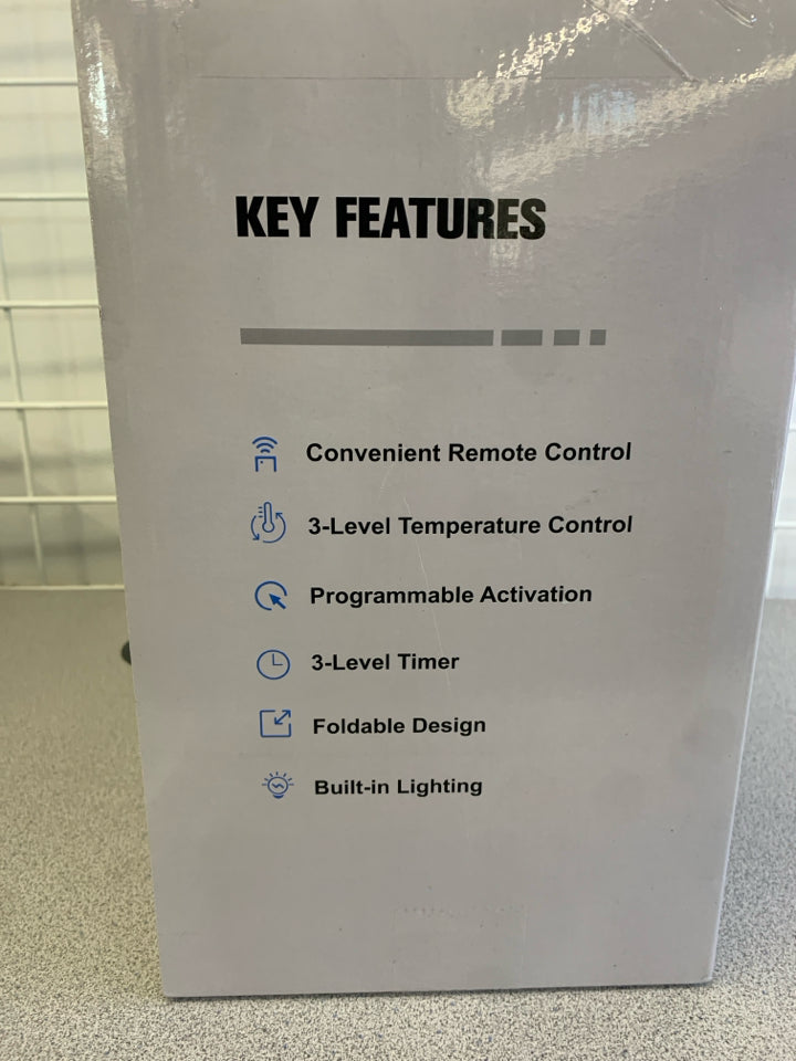 NIB FOLDABLE TOWEL WARMER.