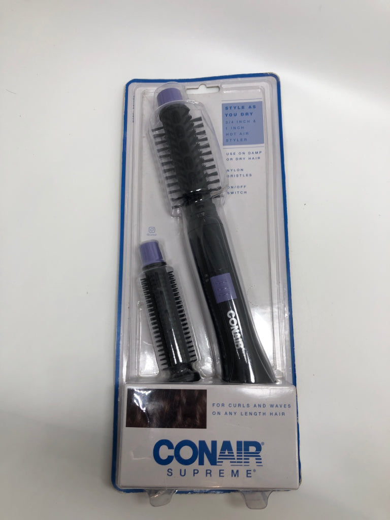 NIP CONAIR SUPREME CURLING IRON.