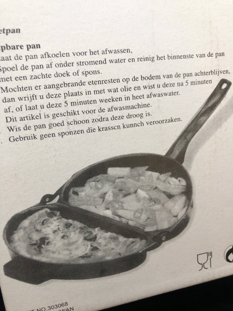 NIB OMELET PAN.