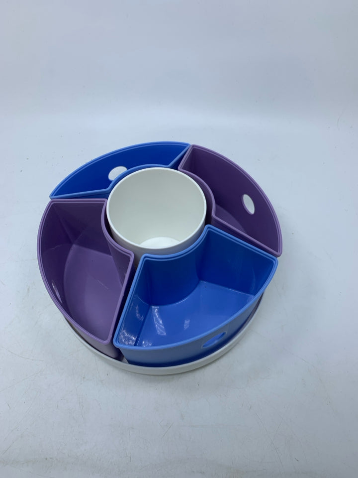 PLASTIC LAZY SUSAN W/ COLORFUL REMOVABLE SLOTS.