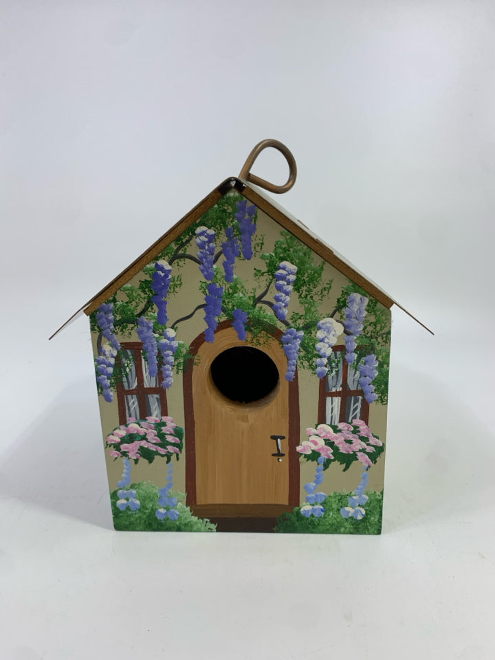 HAND PAINTED BIRD HOUSE WITH COPPER TIN ROOF.