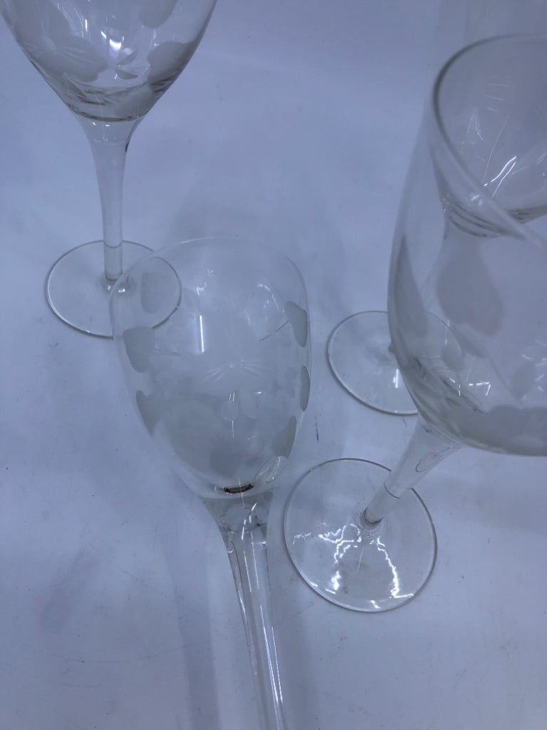 4 LIGHT WHITE ETCHED FLORAL WINE GLASSES.