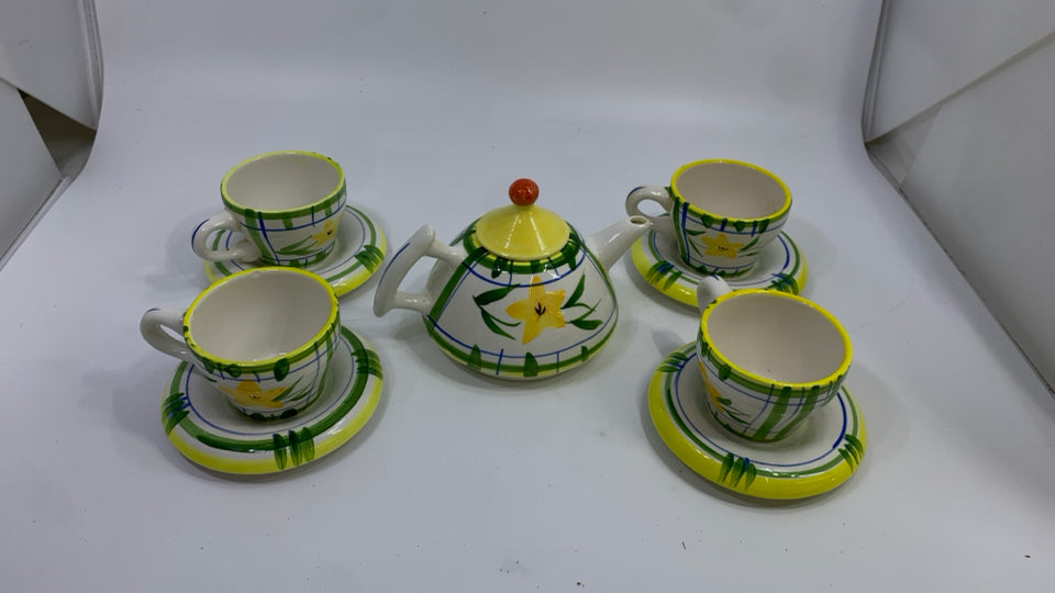 9PC YELLOW FLOWER/GREEN STRIPE TEAPOT AND CUP SET.