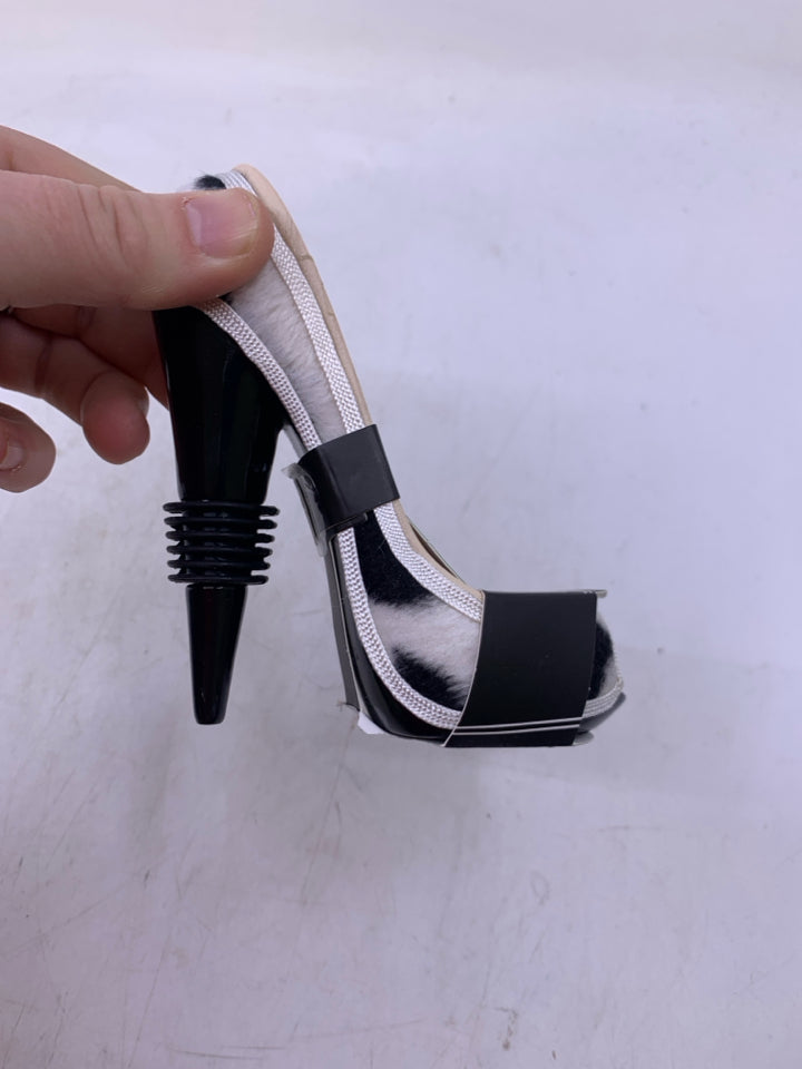 RESIN HIGH HEEL WHINE STOPPER.