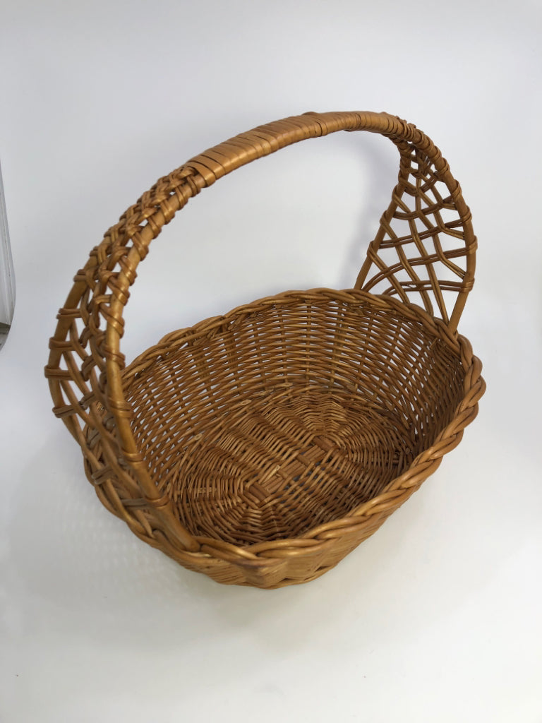 TAN BRAIDED BASKET W/BRAIDED & WRAPPED HANDLE.