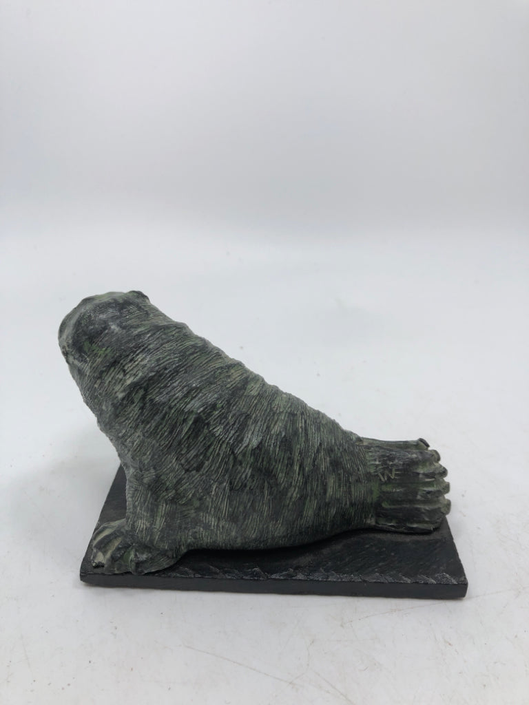 VTG STONE CARVED WALRUS W/WHITE TUSKS.