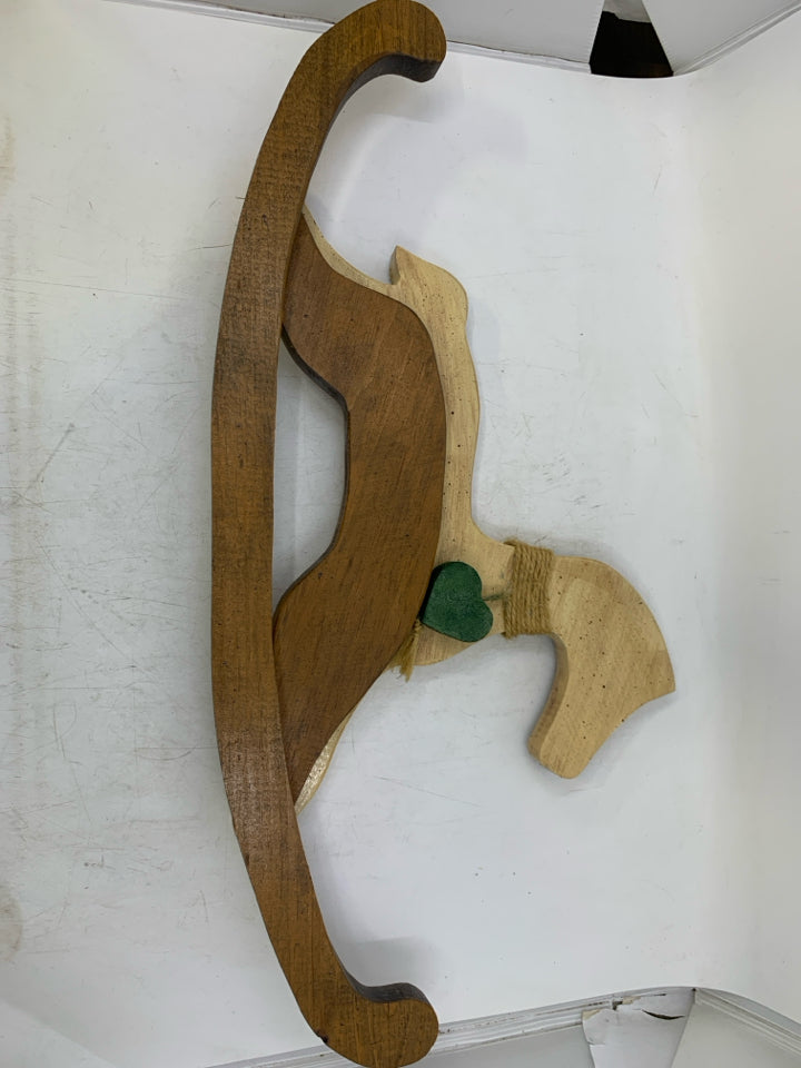 WOOD PRIMITIVE STYLE ROCKING HORSE W/ GREEN HEART AROUND NECK.