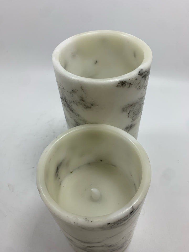 2 FAUX MARBLE RESIN LED CANDLES.