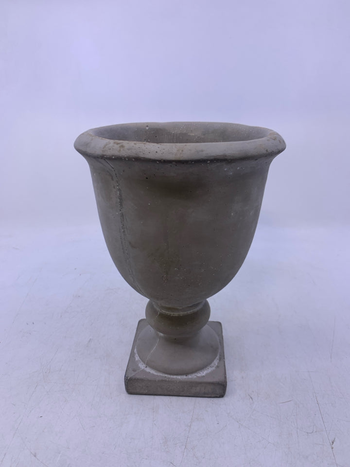GREY CEMENT FOOTED PLANTER.