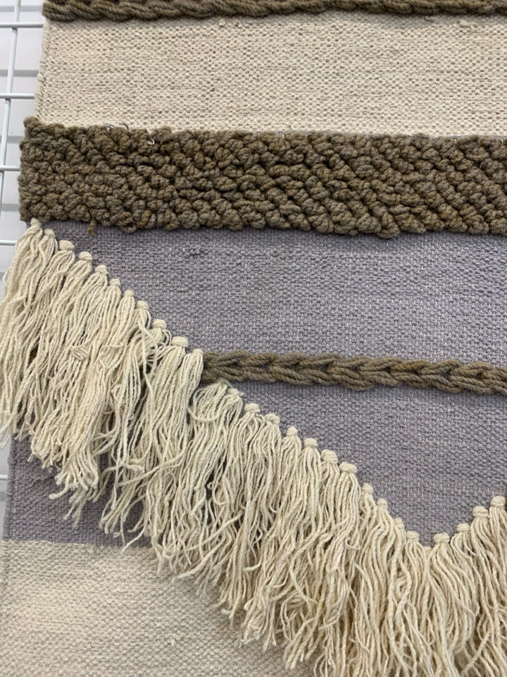 LARGE WOVEN TAPESTRY W/TASSLES.