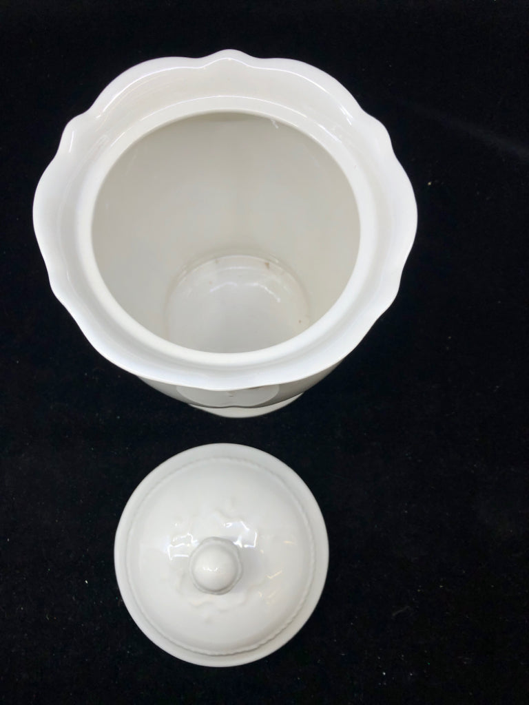 WHITE EMBOSSED FOOTED CANISTER W LID.