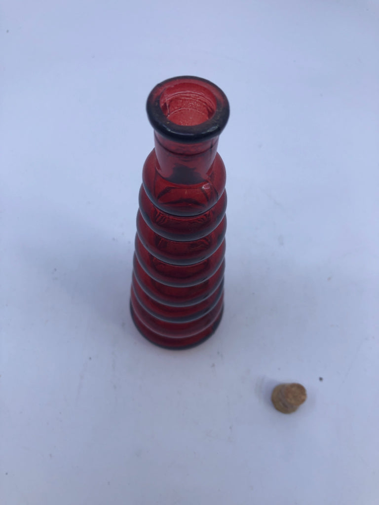 RED GLASS RIBBED BOTTLE W/CORK.