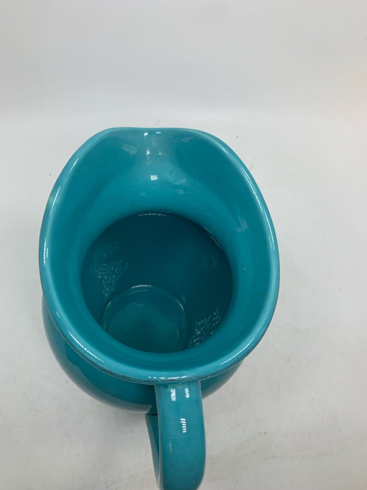 CERAMIC PITCHER.