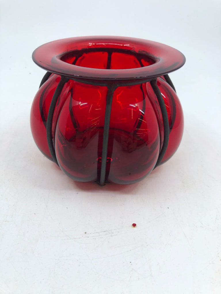 RED VASE W BLACK METAL.