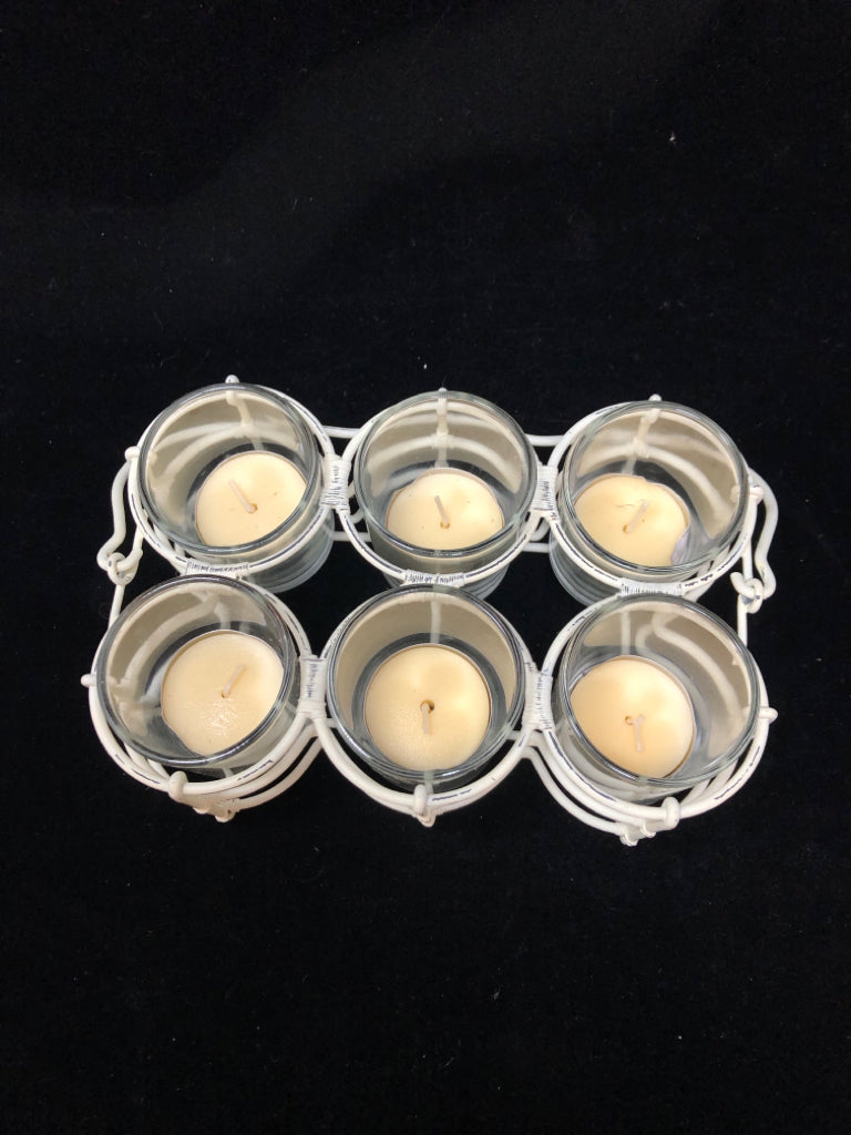 WHITE METAL VOTIVE HOLDER W/HANDLE.