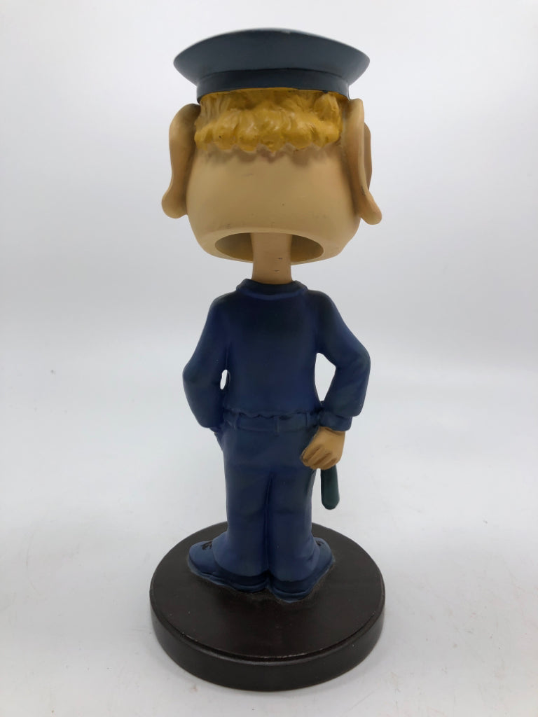 #1 POLICEMAN BOBBLE HEAD.