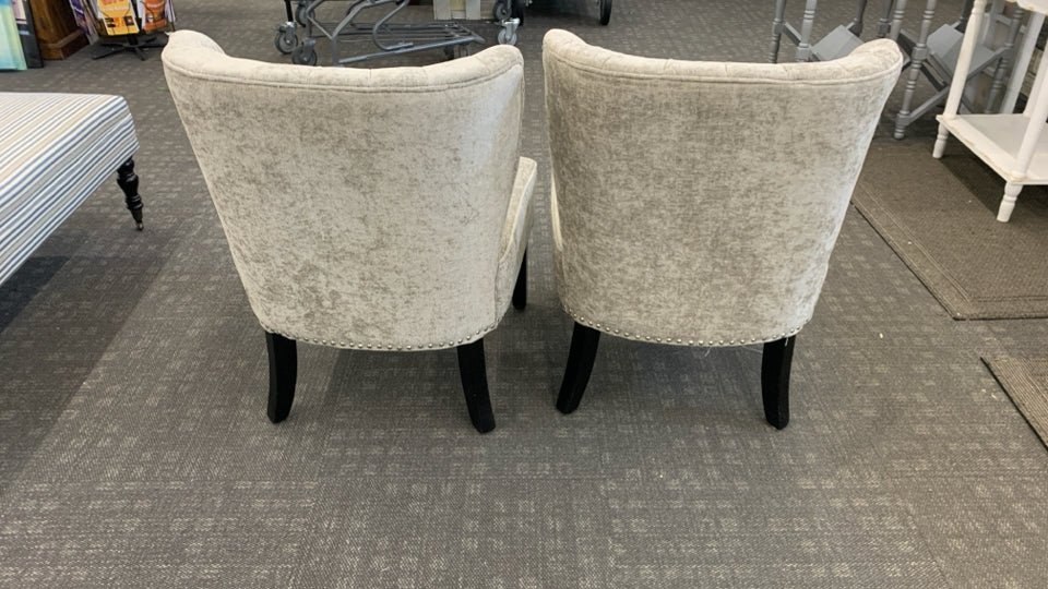 2 UPHOLSTERED GRAY CHAIRS W/NAILHEAD DETAIL.