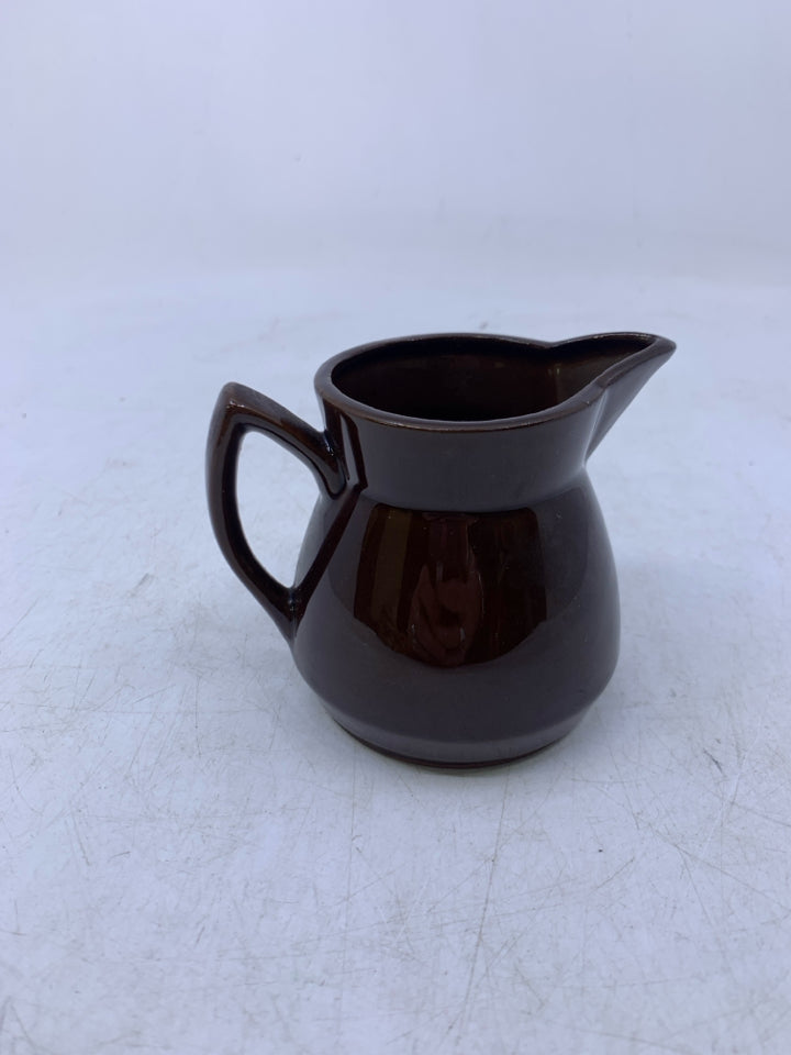 BROWN CERAMIC SMALL PITCHER.