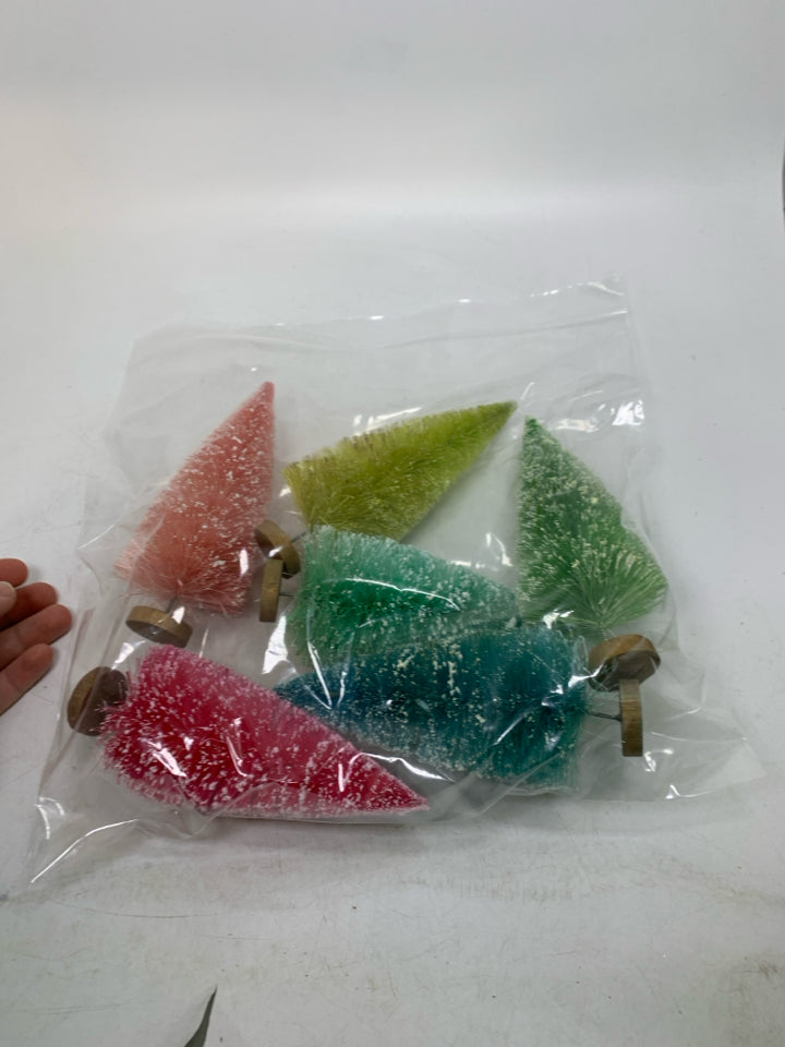 6 ASSORTED COLORED BRUSH TREES IN BAG.