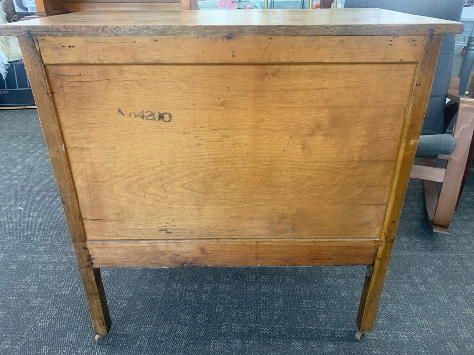 VTG WOOD 3 DRAWER DRESSER ON WHEELS.