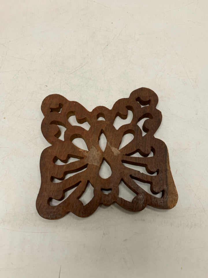 WOOD CARVED BUTTERFLY TRIVET.