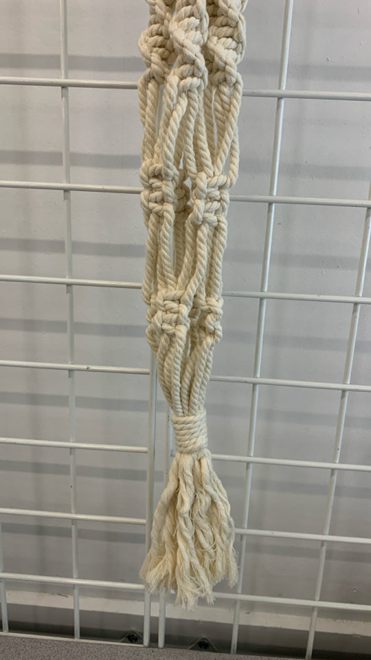 BEADED MACRAME PLANT HOLDER.